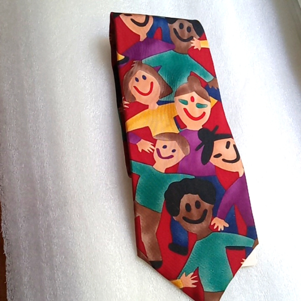 NEW.  MEN'S RED SILK SAVE THE CHILDREN'S FACES TIE - RED  BACKGROUND.  100% SILK